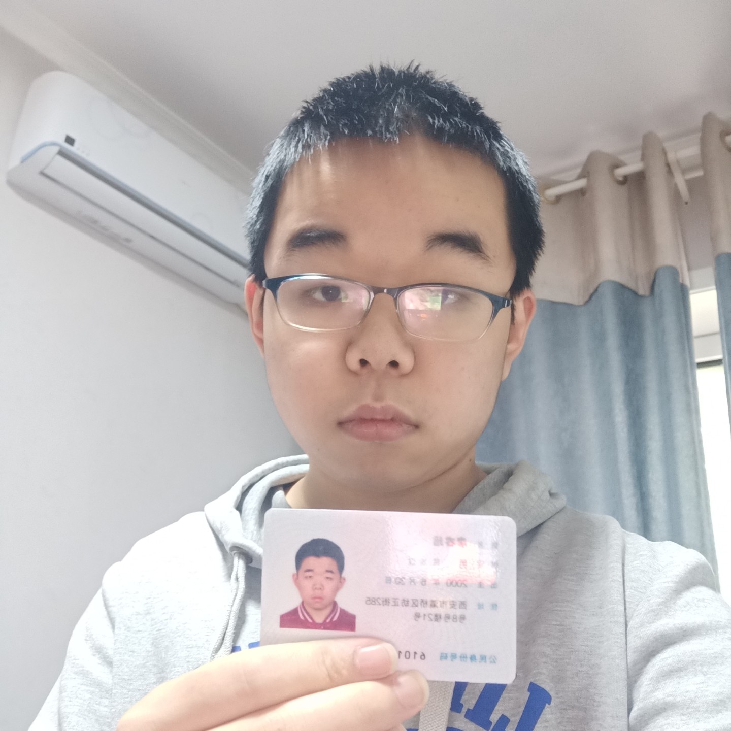 廖教员 照片
