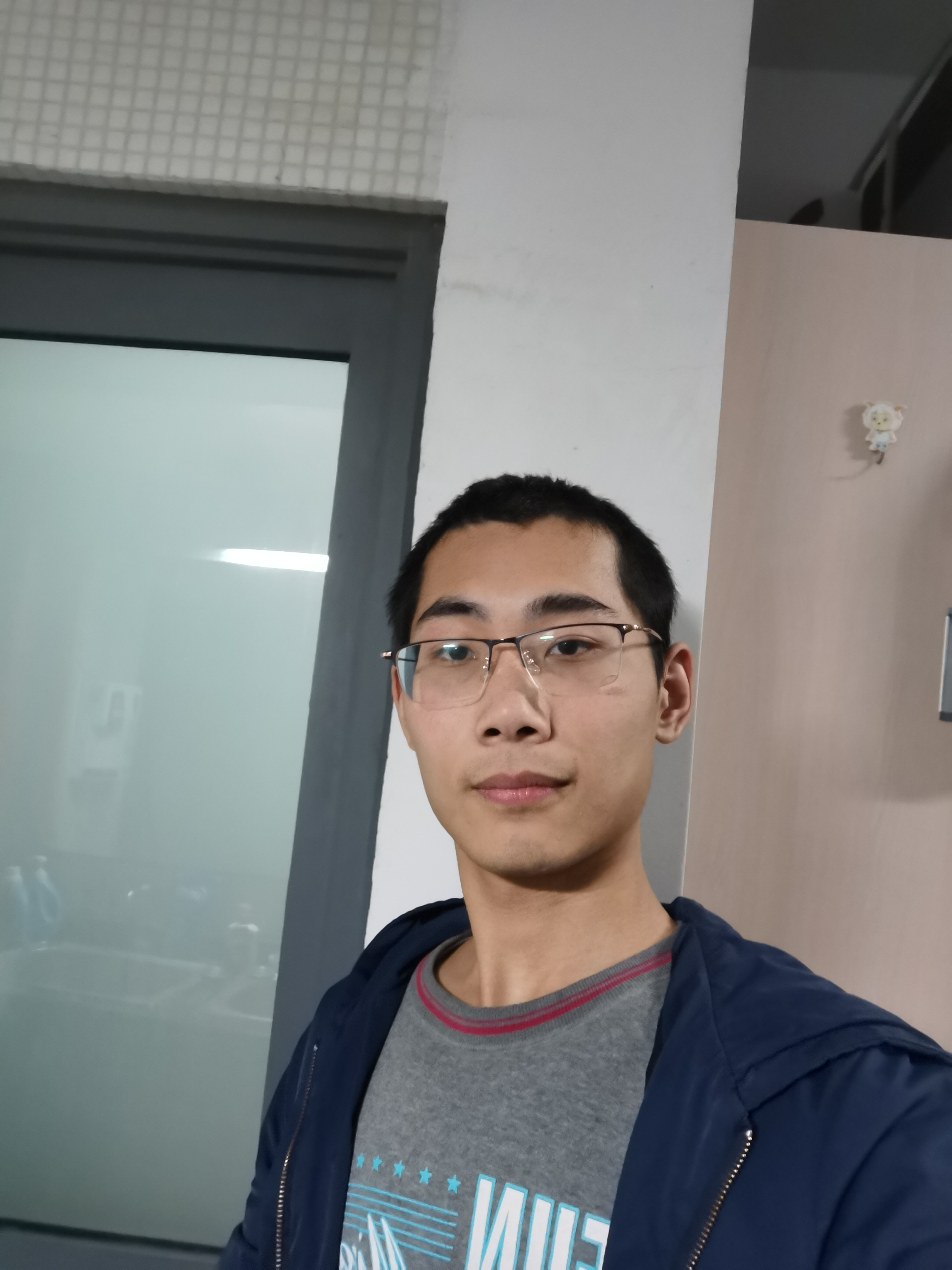 谭教员 照片